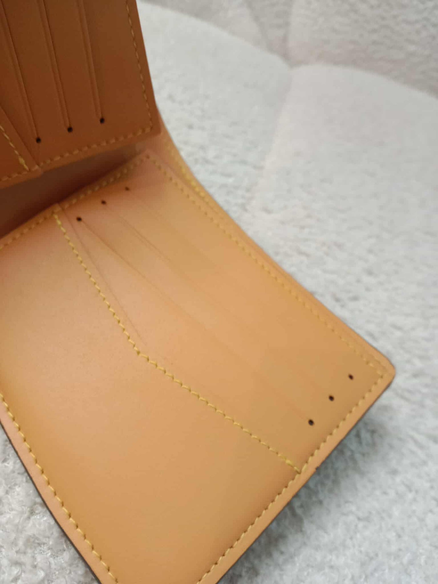 Louis Vuitton Bi-Fold Brown Wallet