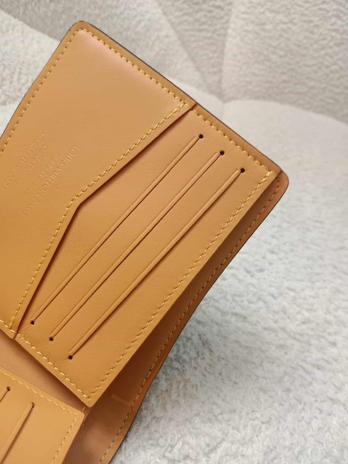 Louis Vuitton Bi-Fold Brown Wallet