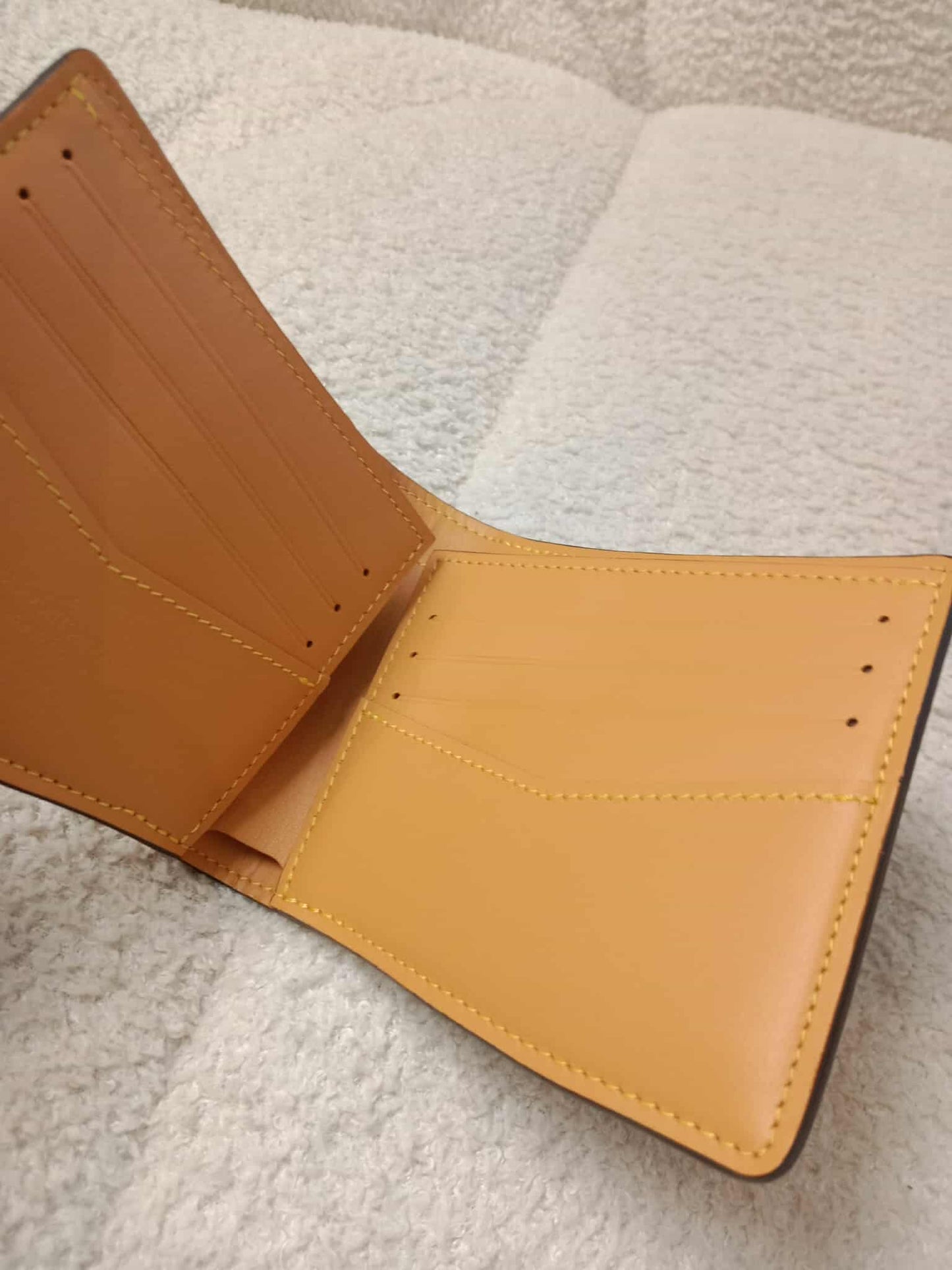 Louis Vuitton Bi-Fold Brown Wallet