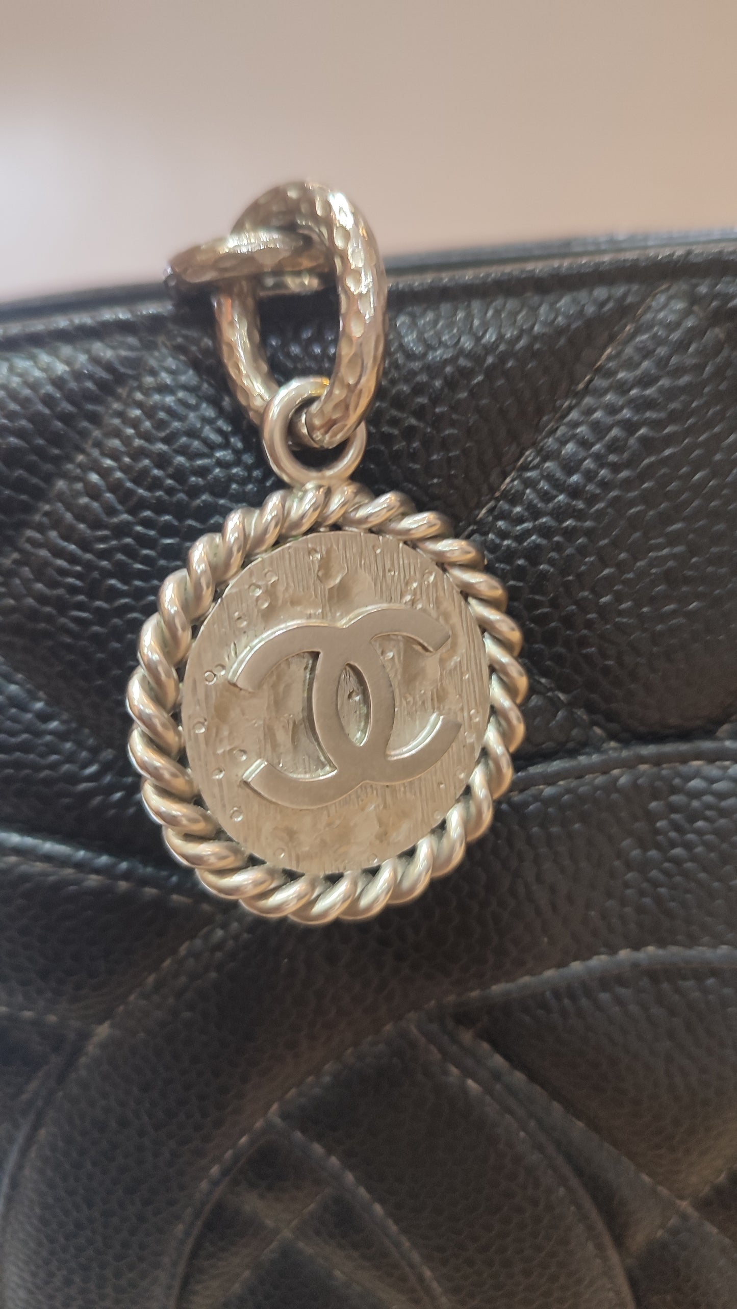 Chanel Medallion Black Caviar Series 7