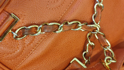 Chanel Vintage CC Backpack Caviar Orange Series 4