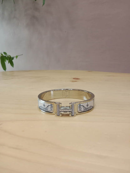 Hermes Clic H Bracelet in the "Grand Apparat Remix" Pattern White Enamel Printed Band Palladium-Plated Hardware GM Size