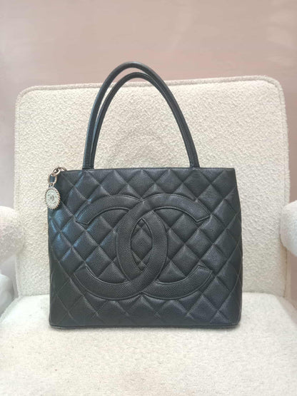 Chanel Medallion Black Caviar Series 7