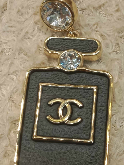 Chanel Black/Gold Perfume Earrings