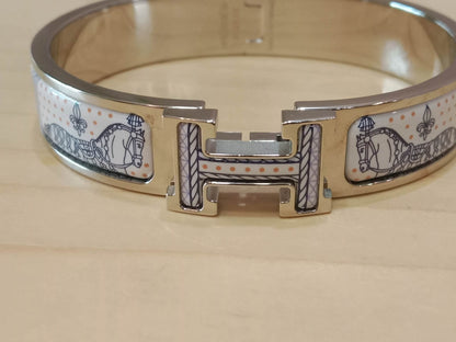 Hermes Clic H Bracelet in the "Grand Apparat Remix" Pattern White Enamel Printed Band Palladium-Plated Hardware GM Size