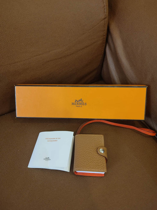 Hermes Ulysse Charm Gold/Capucine Clemence