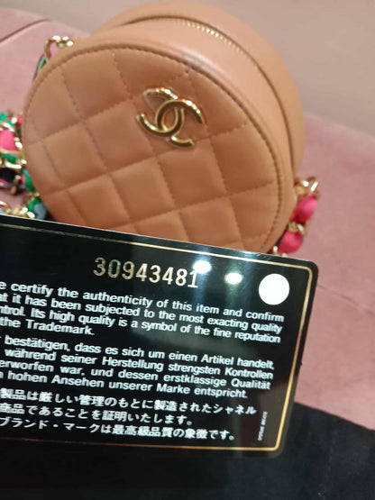 Chanel 21P Round Clutch Lambskin with Multicolor Ribbon-Woven Chain Strap Caramel Series 30