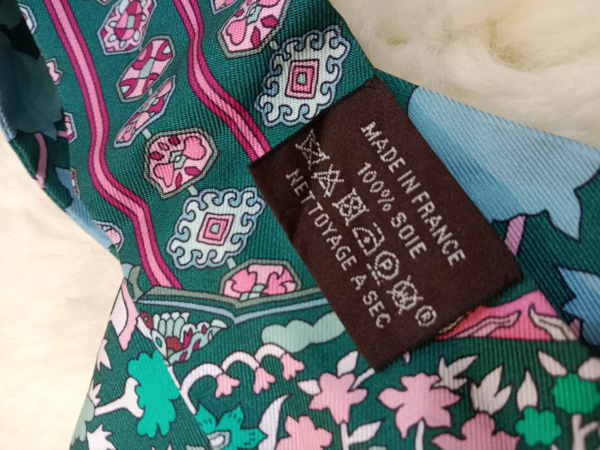 Hermes Tapis Persans Silk Twilly Scarf Featuring an Intricate Floral Pattern in Teal Green/Blue/Pink