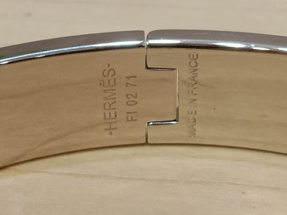 Hermes Clic H Bracelet in the "Grand Apparat Remix" Pattern White Enamel Printed Band Palladium-Plated Hardware GM Size
