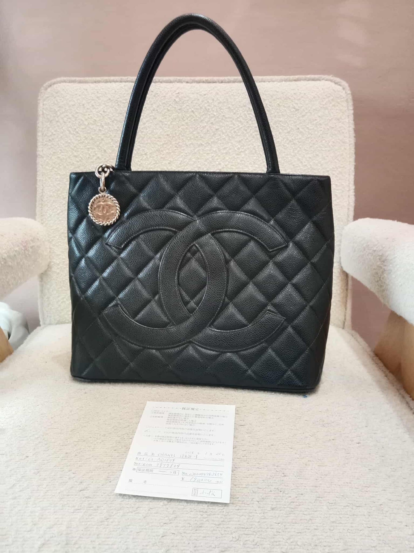 Chanel Medallion Black Caviar Series 7