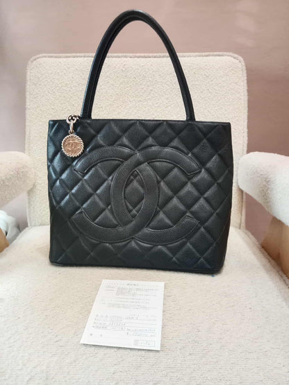 Chanel Medallion Black Caviar Series 7