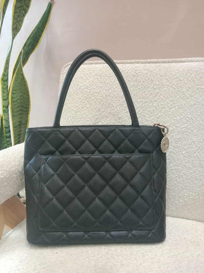 Chanel Medallion Black Caviar Series 7