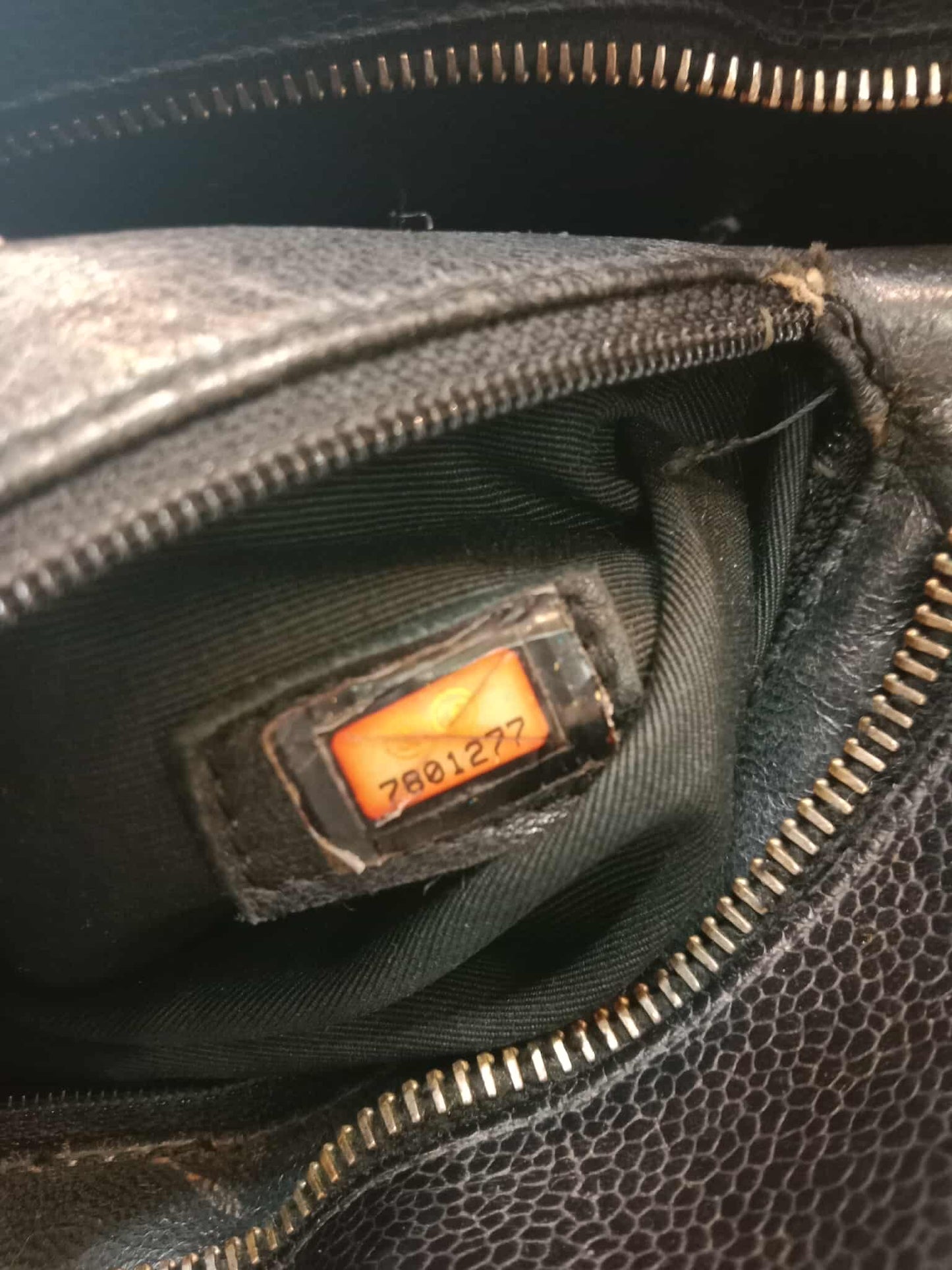 Chanel Medallion Black Caviar Series 7