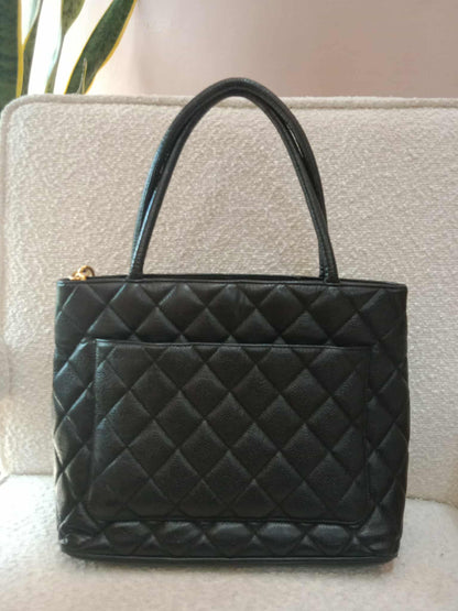 Chanel Medallion Black Caviar Series 7