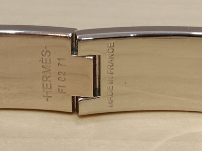 Hermes Clic H Bracelet in the "Grand Apparat Remix" Pattern White Enamel Printed Band Palladium-Plated Hardware GM Size