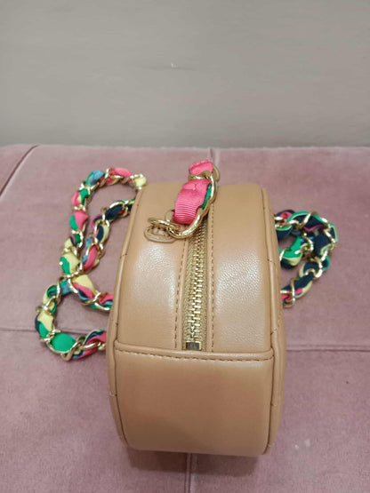 Chanel 21P Round Clutch Lambskin with Multicolor Ribbon-Woven Chain Strap Caramel Series 30