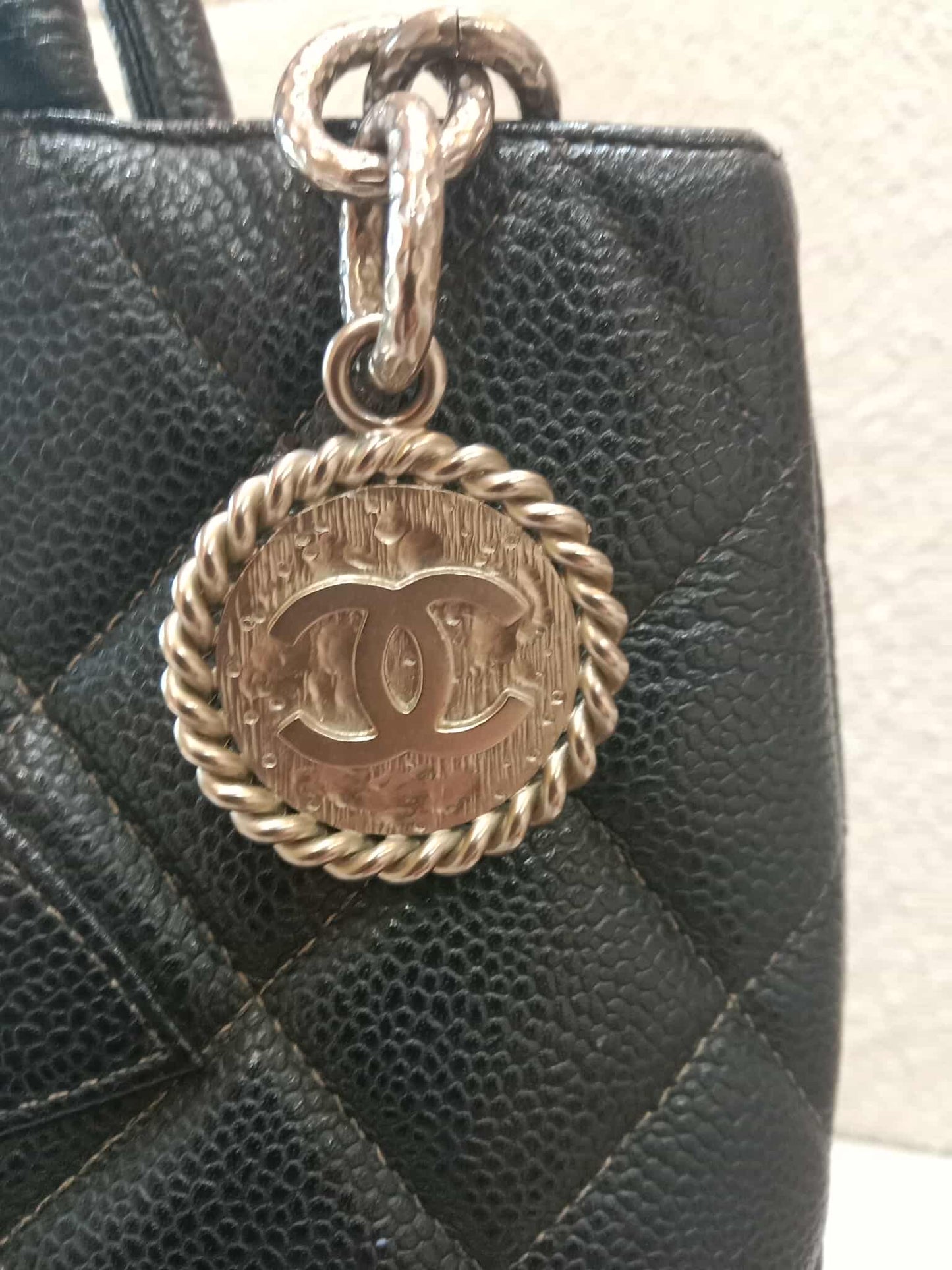 Chanel Medallion Black Caviar Series 7