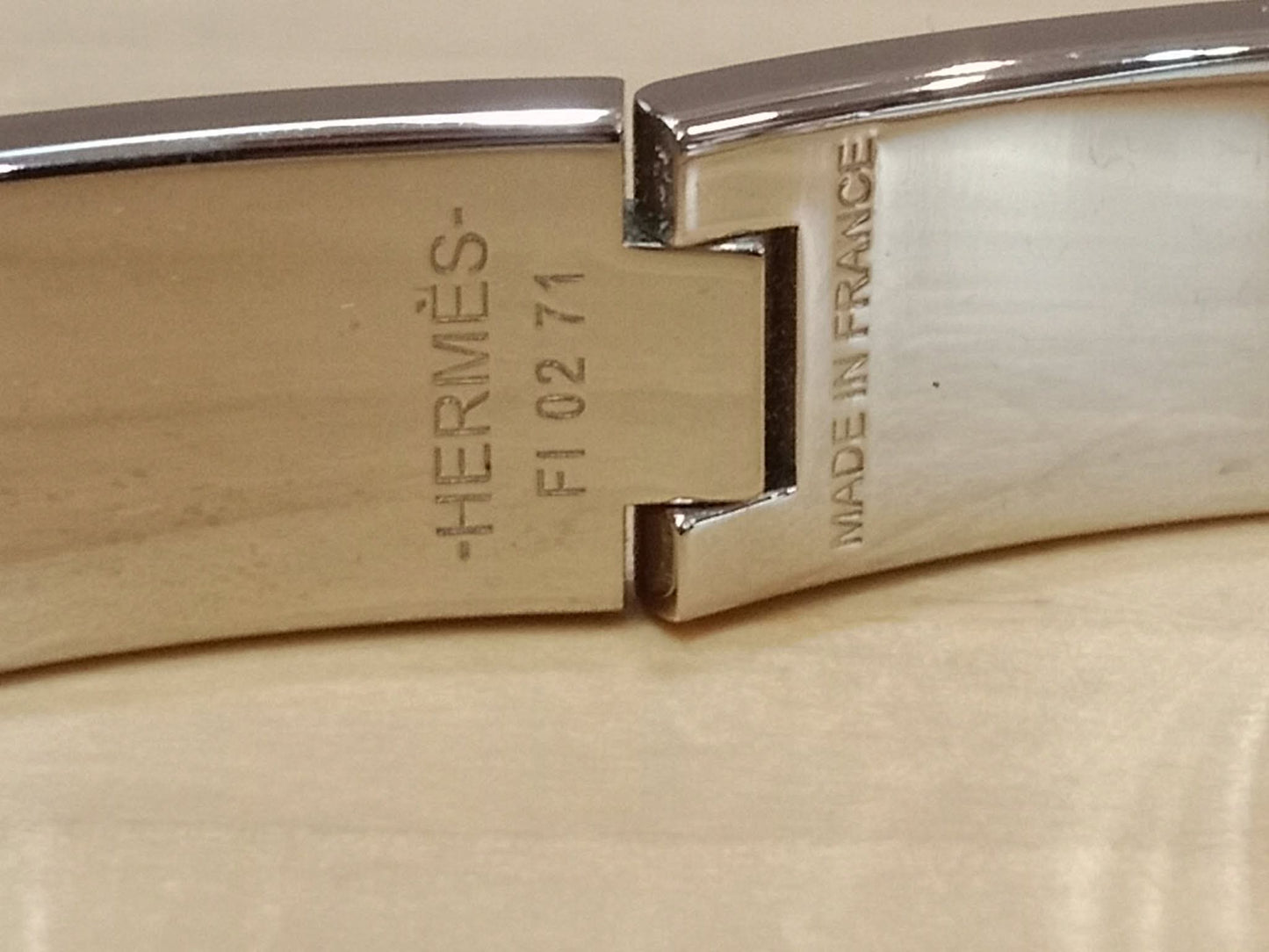 Hermes Clic H Bracelet in the "Grand Apparat Remix" Pattern White Enamel Printed Band Palladium-Plated Hardware GM Size