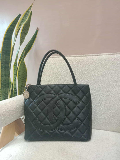 Chanel Medallion Black Caviar Series 7