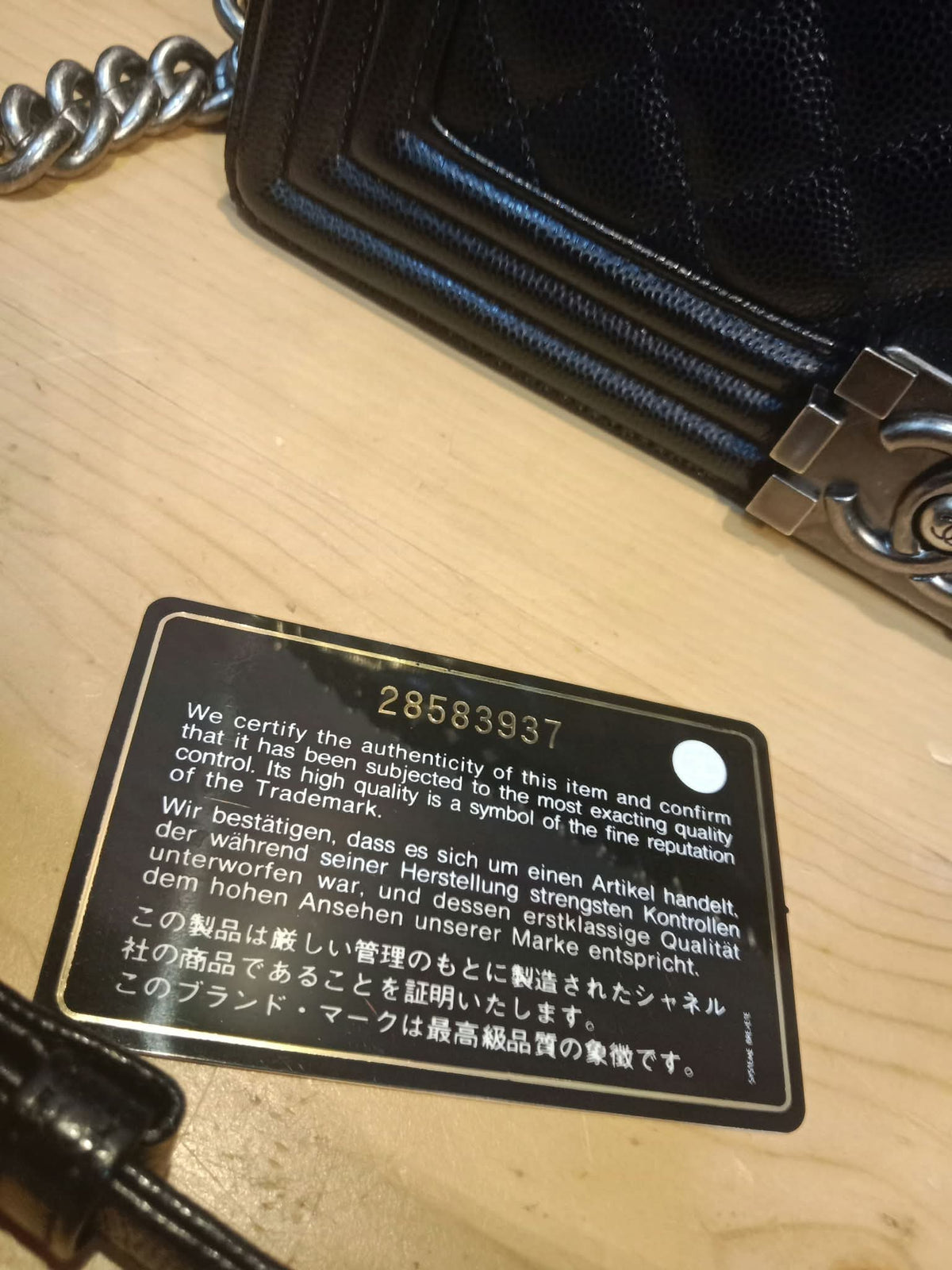Chanel Boy Flap Black Caviar Old Medium Series 28