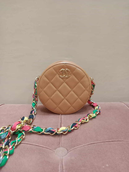 Chanel 21P Round Clutch Lambskin with Multicolor Ribbon-Woven Chain Strap Caramel Series 30