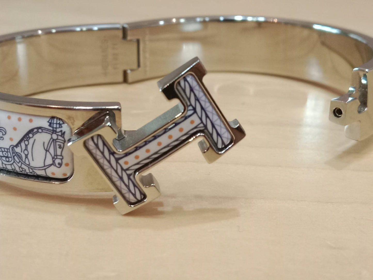 Hermes Clic H Bracelet in the "Grand Apparat Remix" Pattern White Enamel Printed Band Palladium-Plated Hardware GM Size