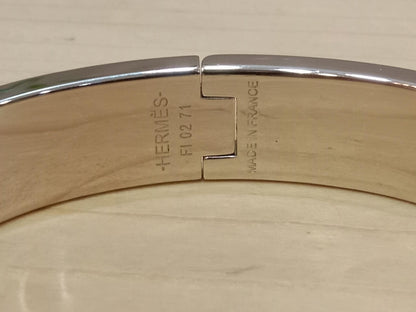 Hermes Clic H Bracelet in the "Grand Apparat Remix" Pattern White Enamel Printed Band Palladium-Plated Hardware GM Size