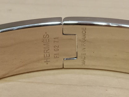 Hermes Clic H Bracelet in the "Grand Apparat Remix" Pattern White Enamel Printed Band Palladium-Plated Hardware GM Size
