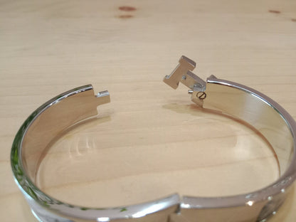 Hermes Clic H Bracelet in the "Grand Apparat Remix" Pattern White Enamel Printed Band Palladium-Plated Hardware GM Size