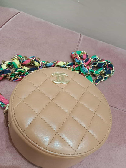 Chanel 21P Round Clutch Lambskin with Multicolor Ribbon-Woven Chain Strap Caramel Series 30