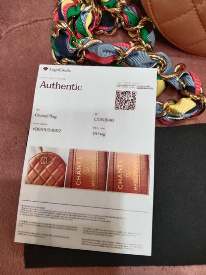 Chanel 21P Round Clutch Lambskin with Multicolor Ribbon-Woven Chain Strap Caramel Series 30