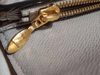 Louis Vuitton Twist Taupe Epi Wallet