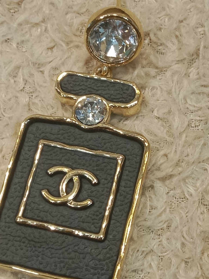 Chanel Black/Gold Perfume Earrings