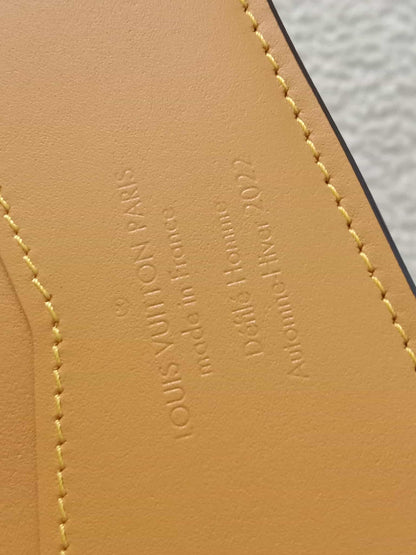 Louis Vuitton Bi-Fold Brown Wallet