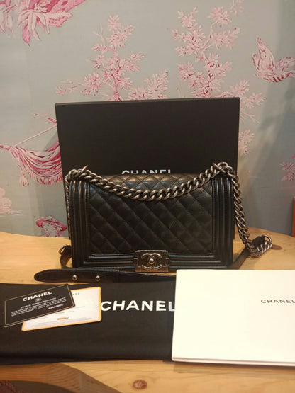 Chanel Boy Flap Black Caviar Old Medium Series 28