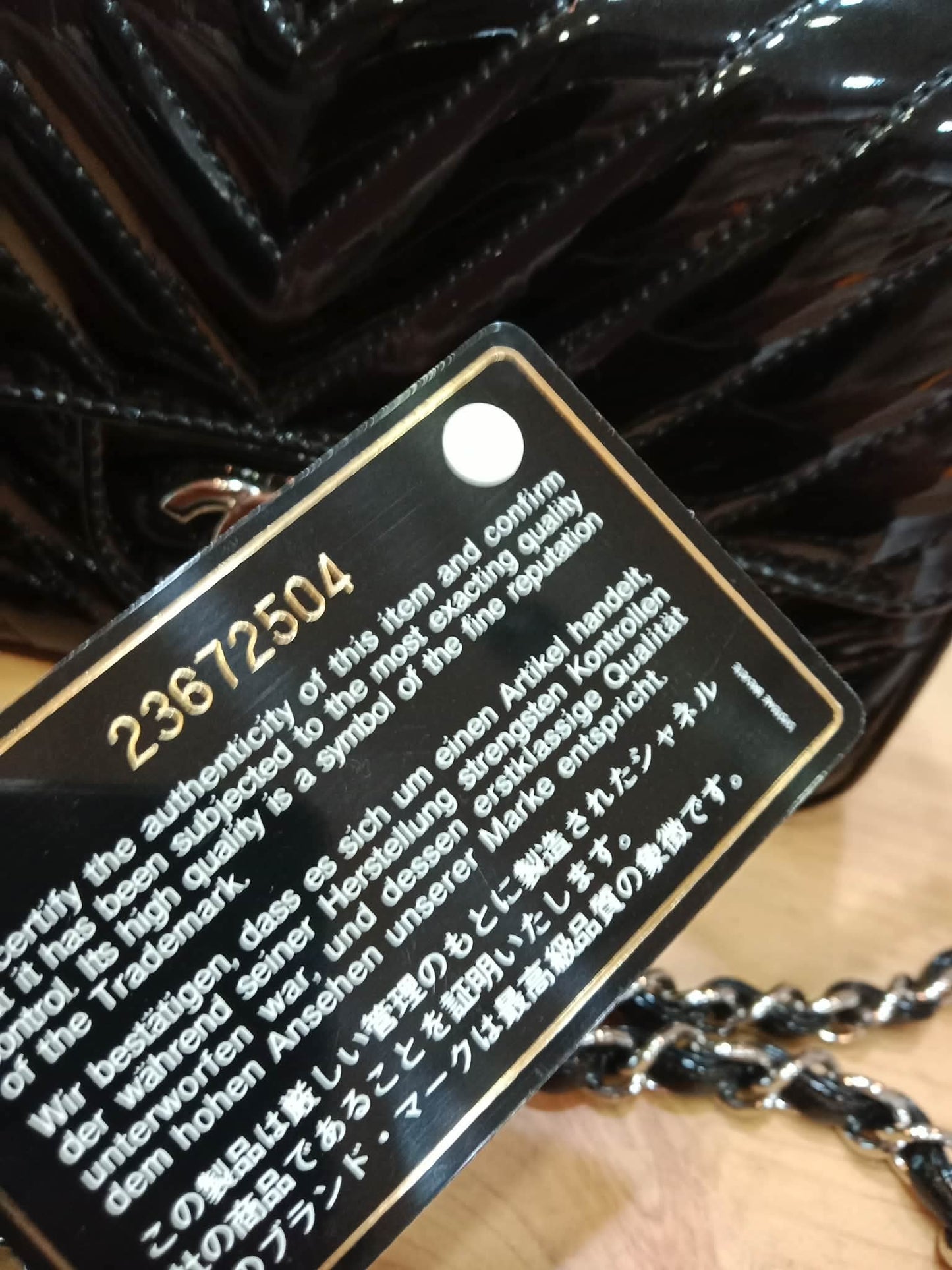 Chanel Classic Rectangular Mini Flap Patent Black Series 23
