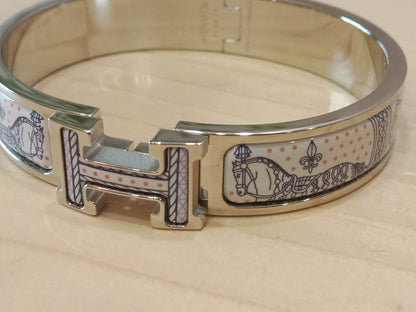 Hermes Clic H Bracelet in the "Grand Apparat Remix" Pattern White Enamel Printed Band Palladium-Plated Hardware GM Size