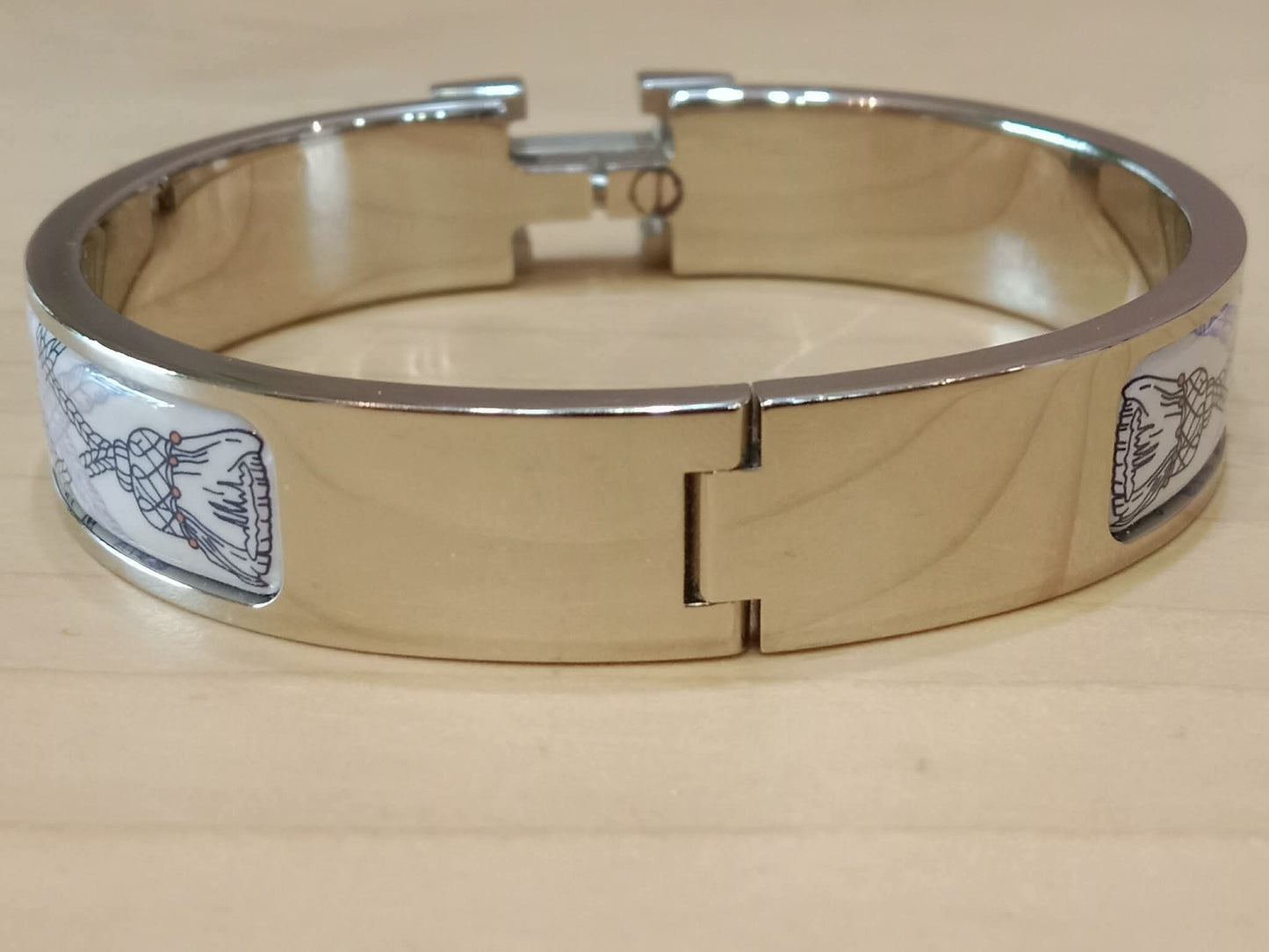 Hermes Clic H Bracelet in the "Grand Apparat Remix" Pattern White Enamel Printed Band Palladium-Plated Hardware GM Size